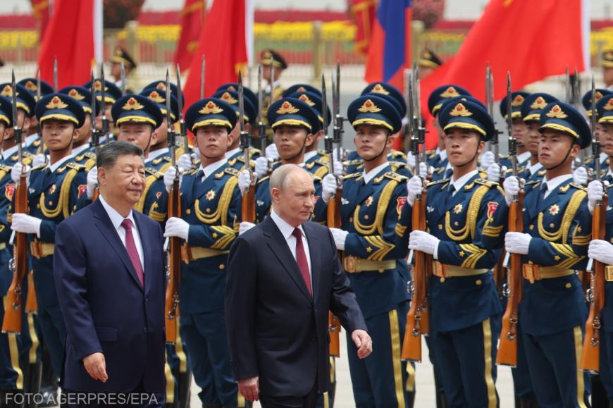 Președintele rus Vladimir Putin, în vizită oficială în China. Alături, președintele chinez Xi Jinping. Sursa foto: Agerpres