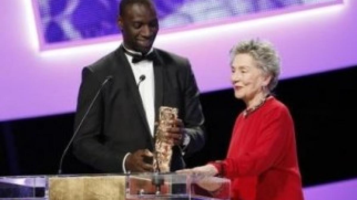 7758706909_amour-de-michael-haneke-grand-vainqueur-des-cesar-2013-avec-notamment-le-cesar-de-la-meilleur-actrice-pour-emmanuelle-riva-ici-avec-omar-sy-laureat-en-2012