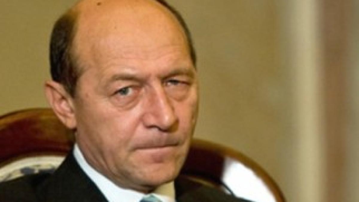1371548221basescu_trist_51685500