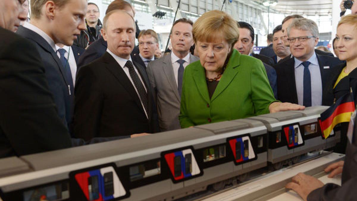 putin_merkel_36010600