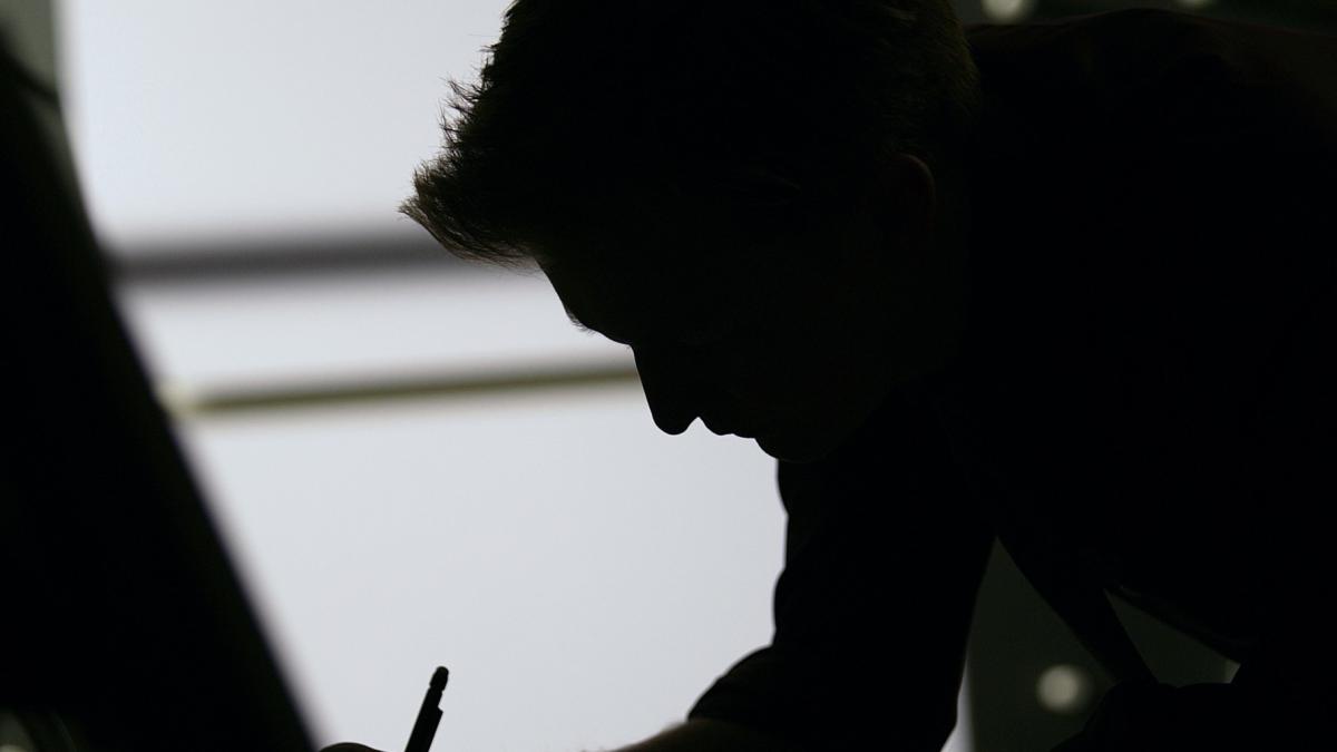 o_shadow_man_desk_facebook_71538700