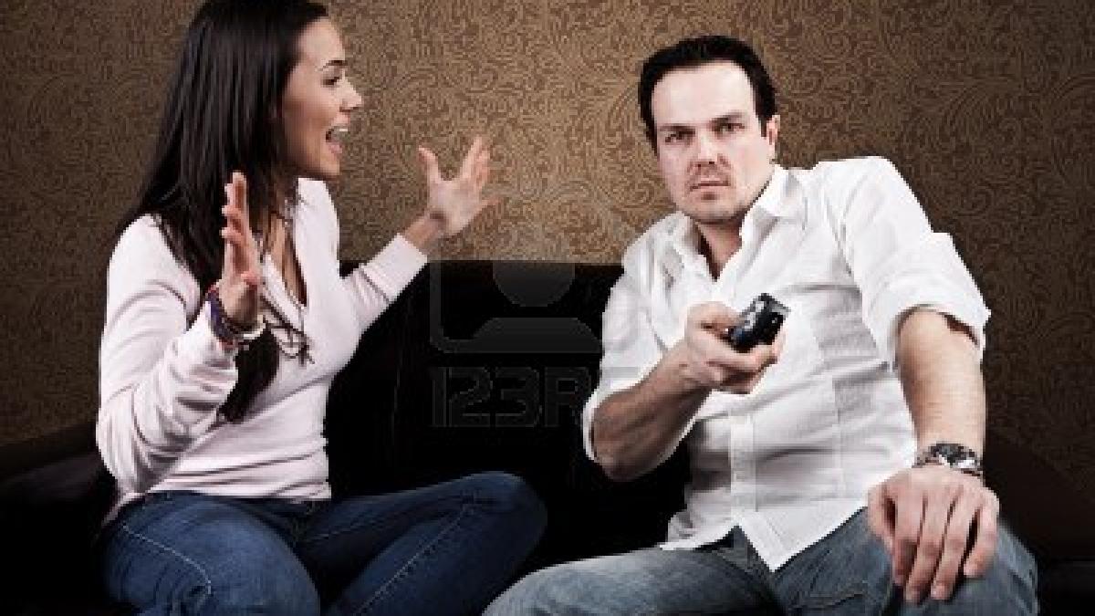 man_on_couch_53907800