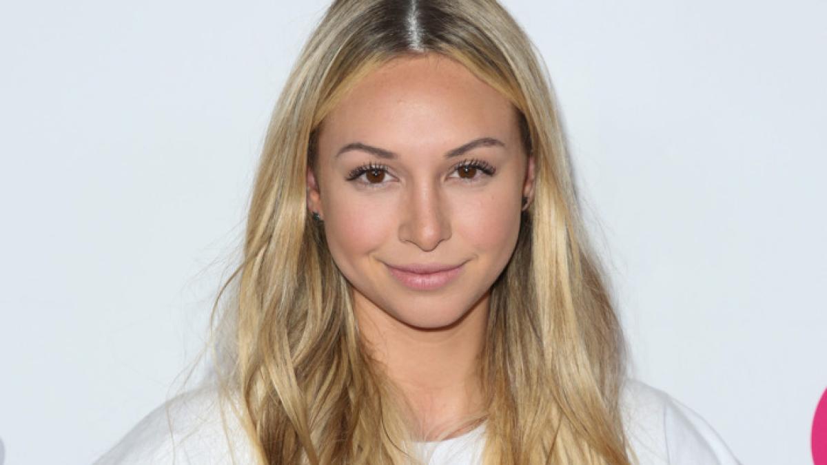 14_corinne_olympios_w710_h473_11742400