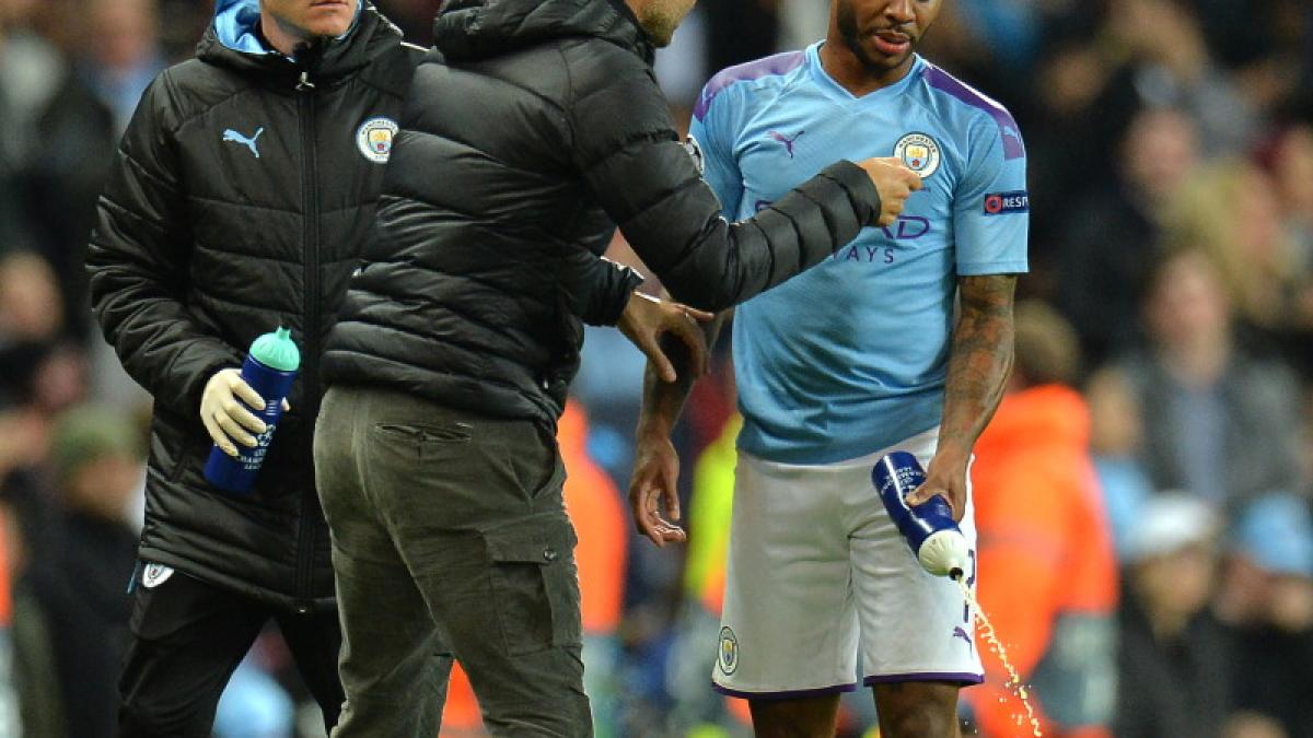 pep_guariola_raheem_sterling_90629400