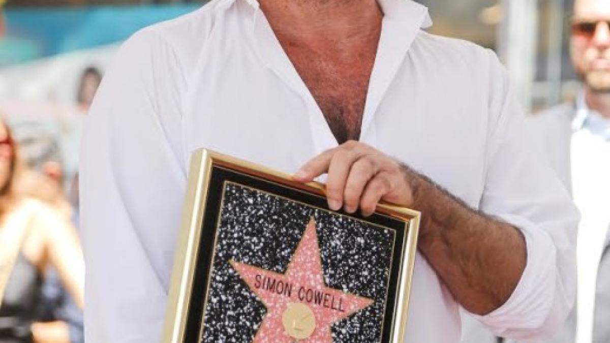 simon_cowell_spate_rupt_04192100