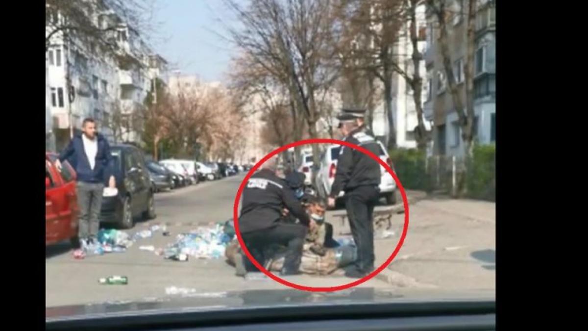 un-barbat-care-strangea-sticle-si-ambalaje-de-plastic-pe-strada--pus-la-pamant-de-politisti-video_13869100
