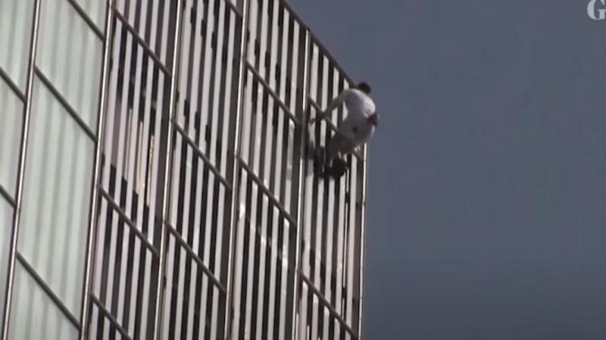 cascadorul-george-king--arestat-dupa-ce-a-escaladat-fara-echipamente-de-siguranta-una-dintre-cele-mai-inalte-cladiri-din-europa---video_53603100