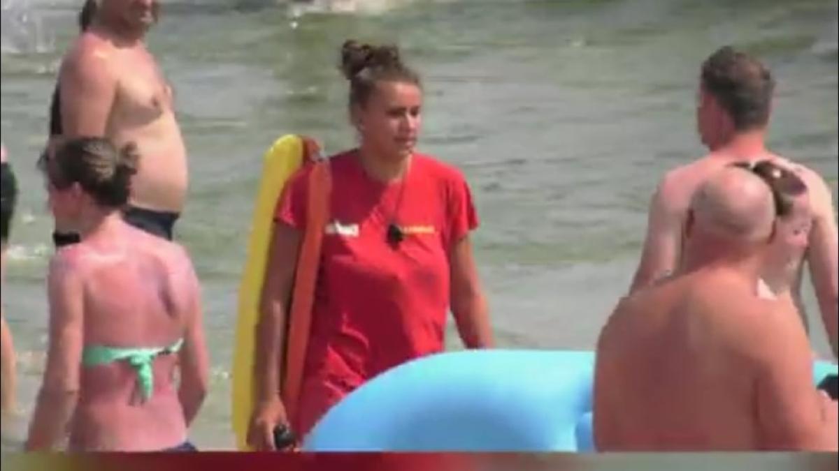 salvaram-plaja-femeie_67464800