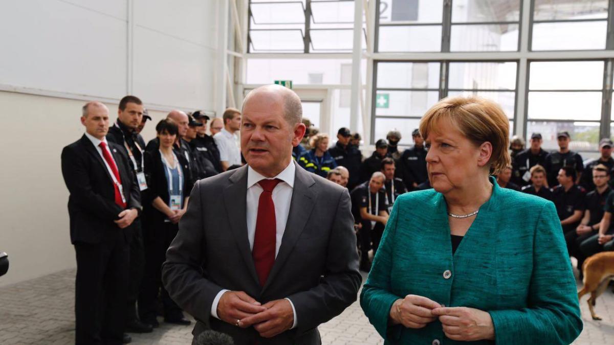 hartmann-angela-merkel-si-olaf-scholz_79387700