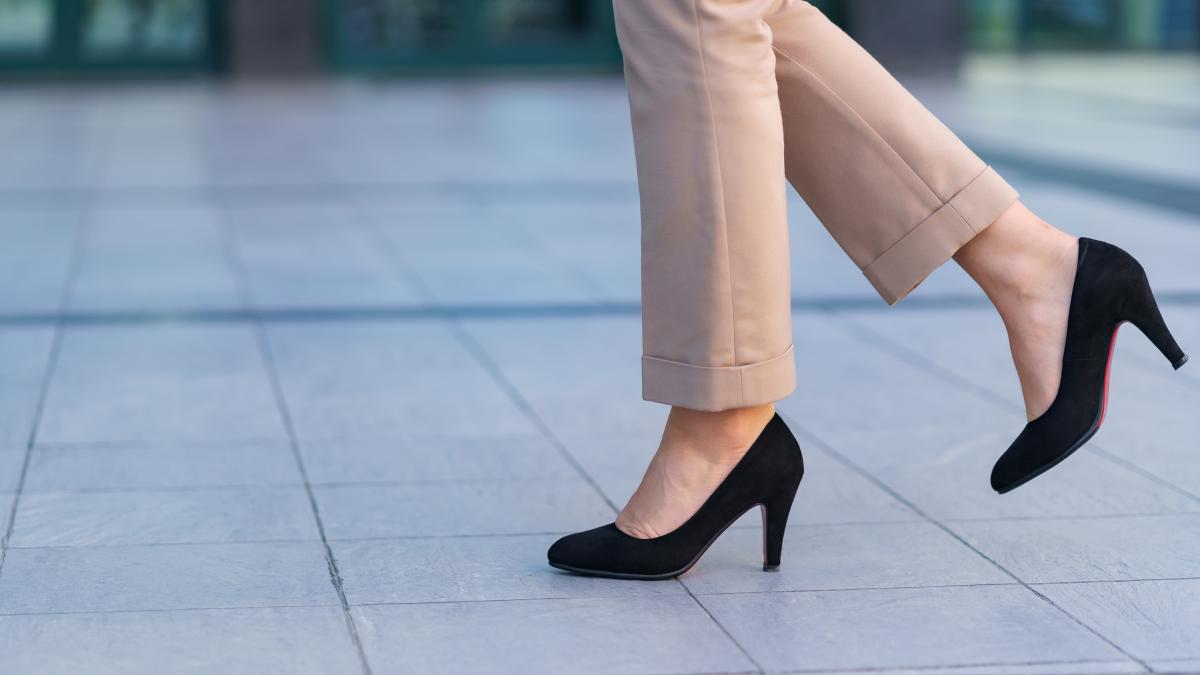 woman-wearing-classic-black-high-heel-toe-shoes-model-posing-street-elegant-outfit-close-up_60819000