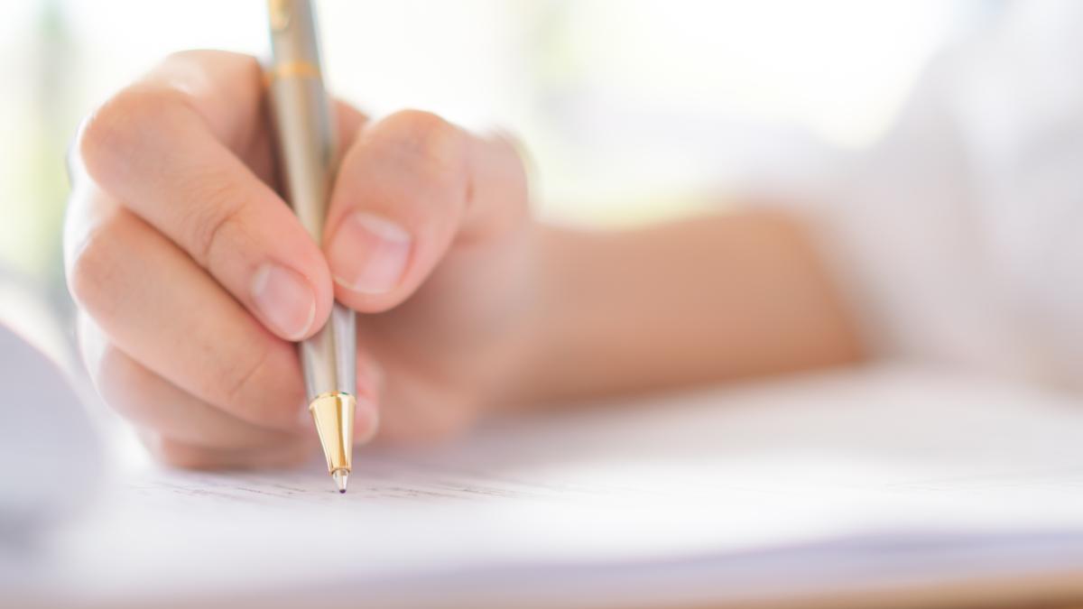 hand-with-pen-application-form_13051700