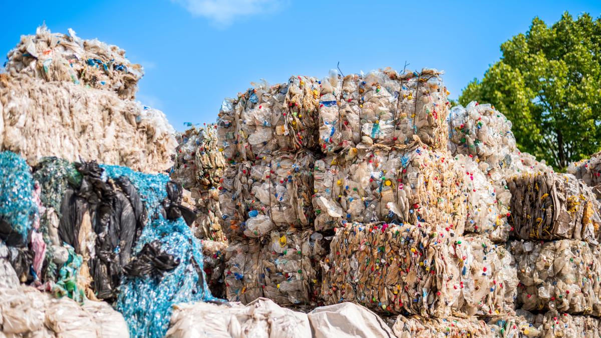 multiple-cubes-compressed-plastic-garbage-near-waste-recycling-factory_97854600