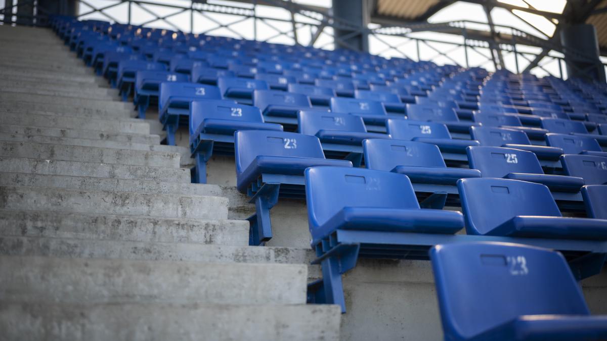 empty-blue-grandstands-low-angle_10918500