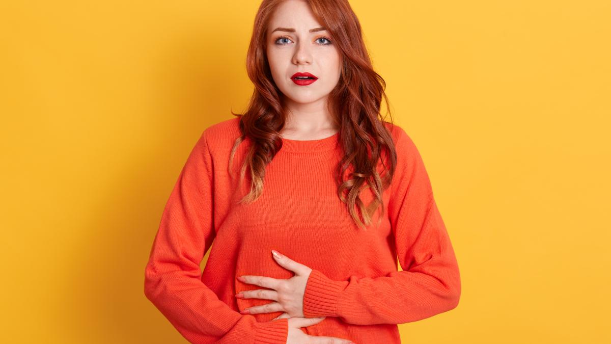 woman-with-stomachache-having-food-poisoning-posing-isolated_62335800
