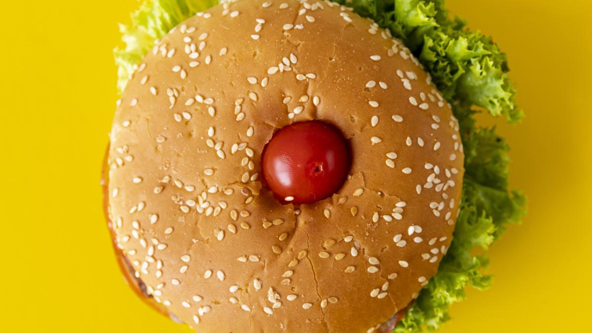 top-view-hamburger-with-yellow-background_74348500_52139600
