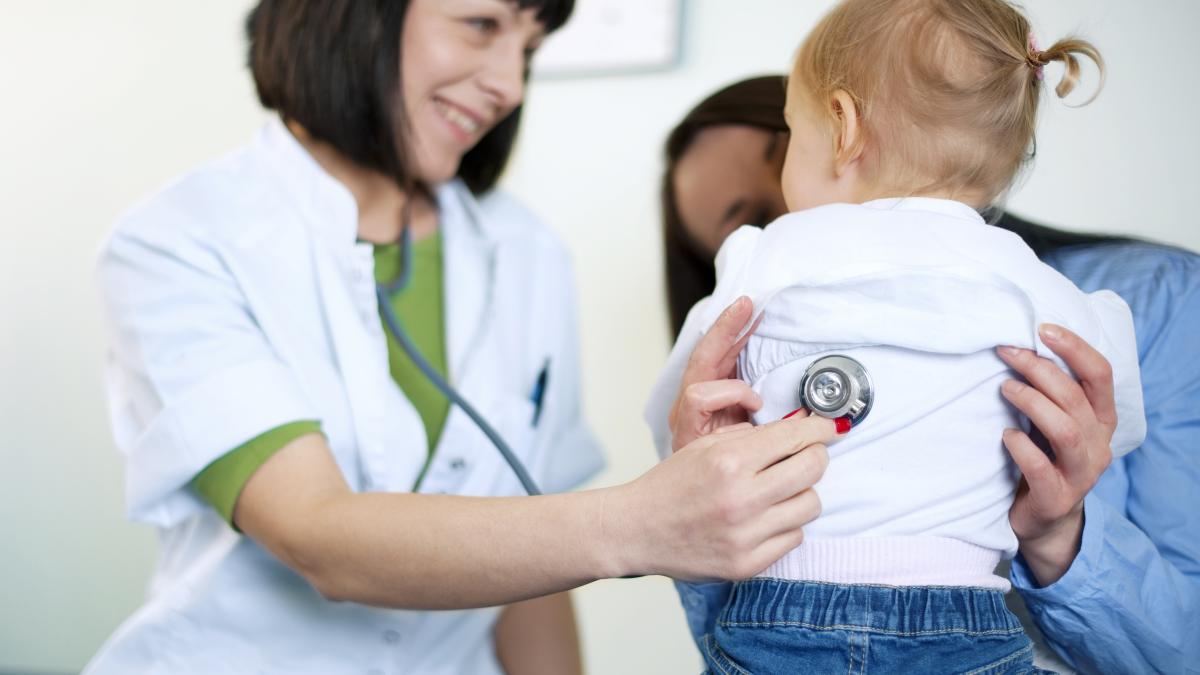 doctor-examining-little-girl_70963500