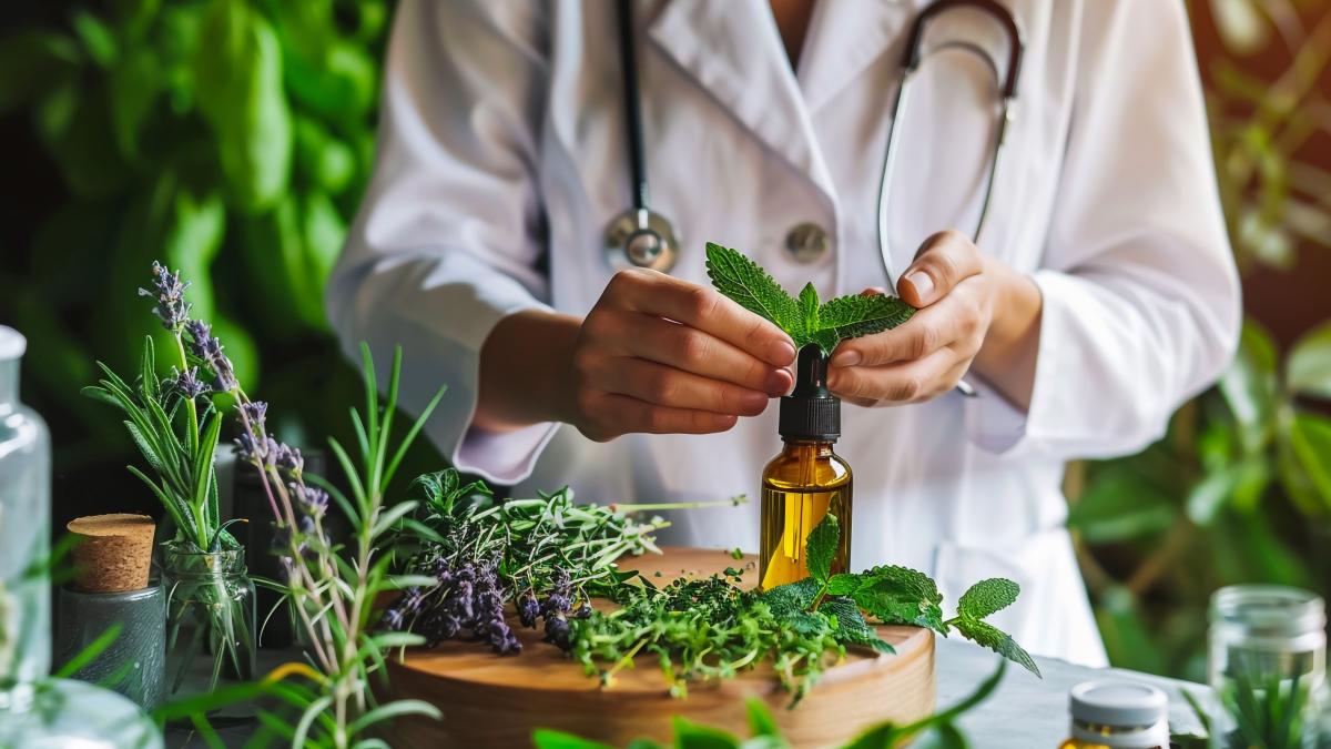 woman-is-working-with-bottle-medicine-plant-with-stethoscope_56950100