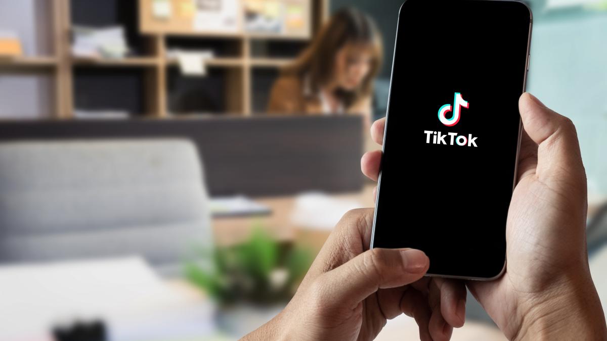 closed-up-image-female-using-tiktok-application-smartphone-office-9-oct-2022-chiangmai-thailand_65410400