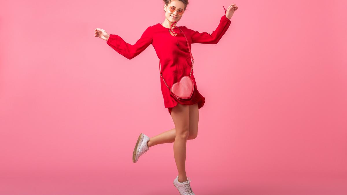 attractive-happy-smiling-stylish-woman-red-trendy-dress-jumping-dancing-pink-wall-isolated-spring-summer-fashion-trend-romantic-mood-flirty-girl_55266800