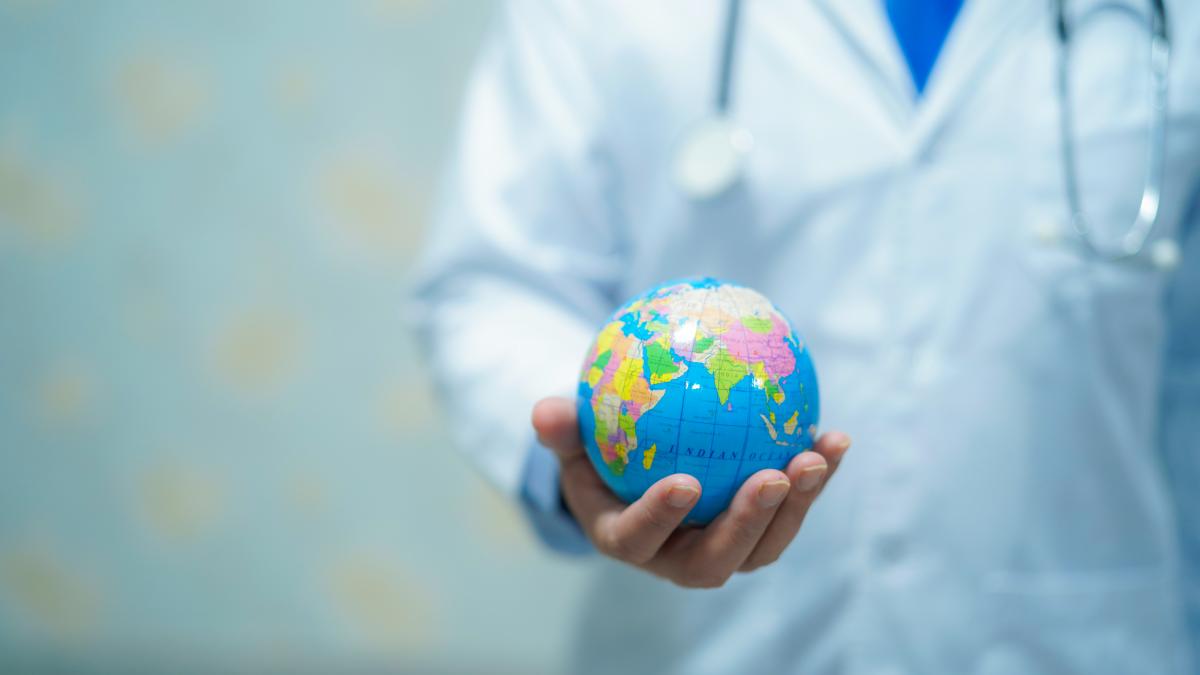 doctor-holding-globe_97010200