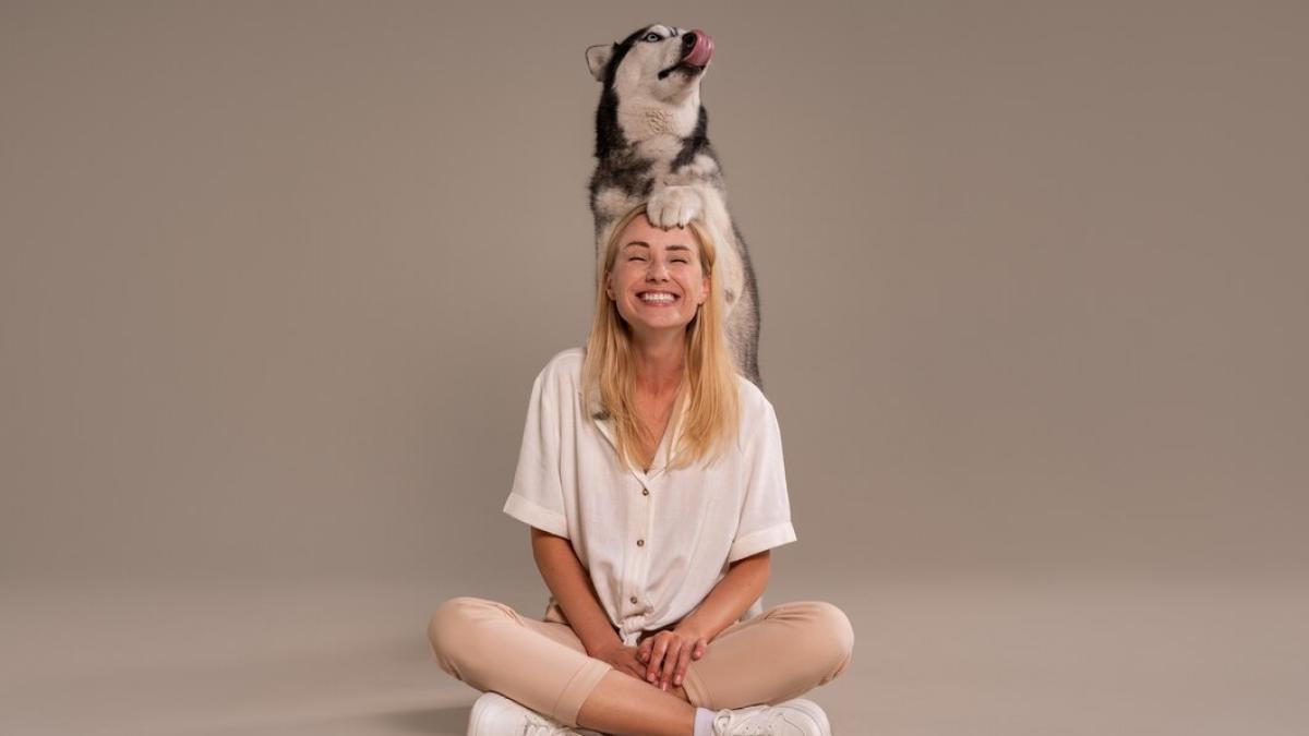 full-shot-woman-with-dog-studio_23-2150747653_30990900