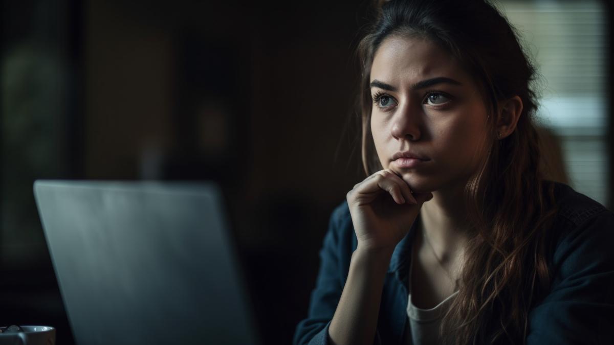 young-woman-home-pondering-work-tasks-generated-by-ai_79137200