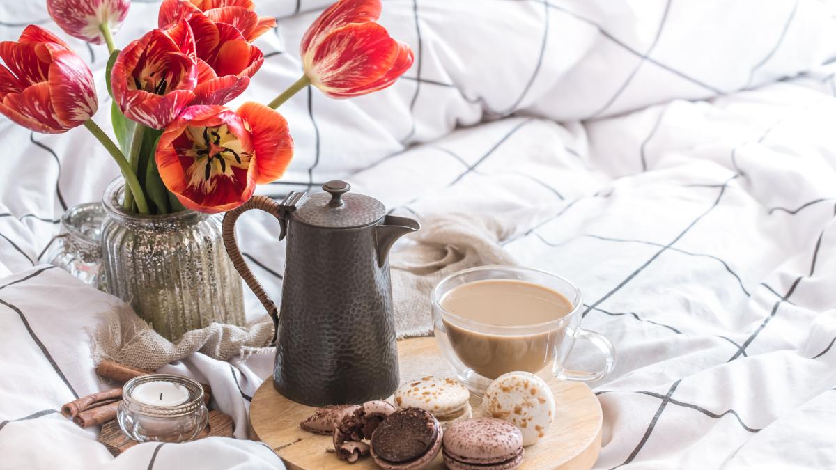 still-life-cozy-breakfast-with-coffee-flowers-bedroom_58751900
