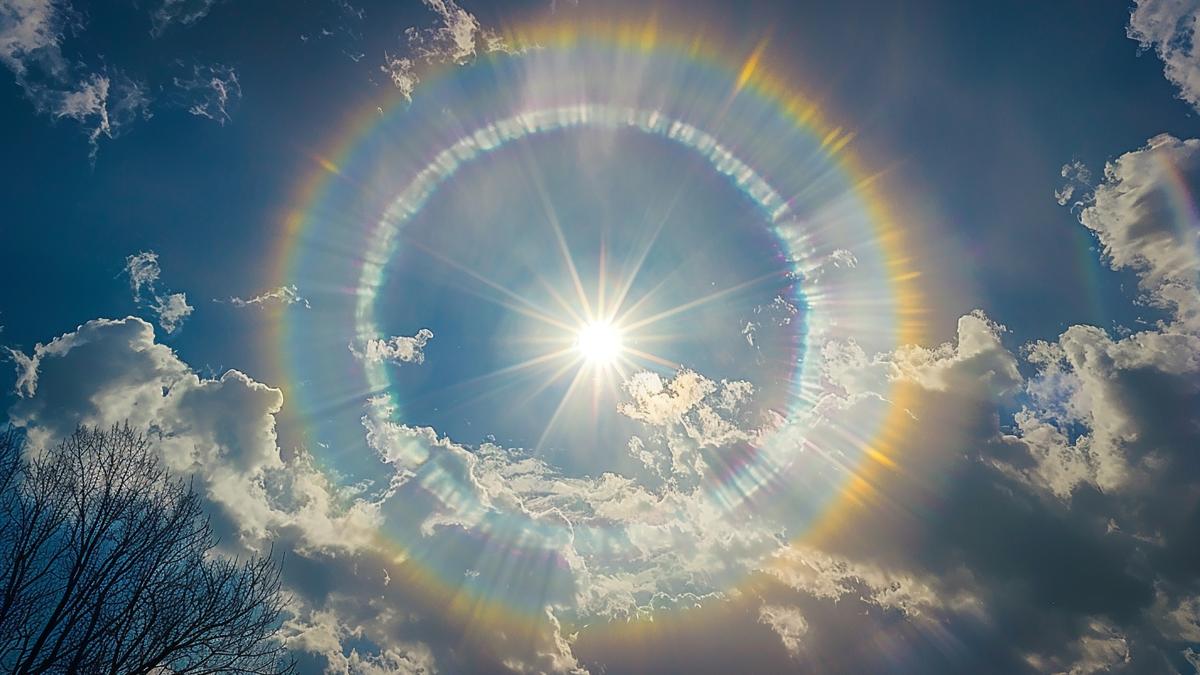 rainbow-sky-is-circle-with-sun-middle_77159800