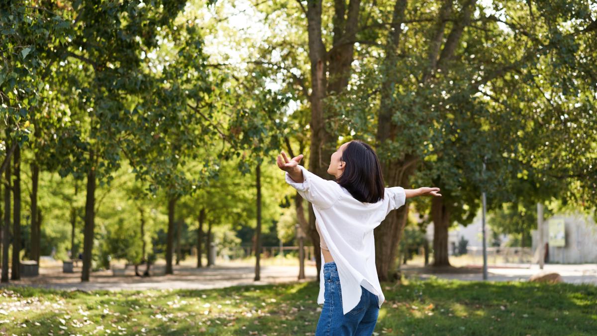 carefree-asian-girl-dancing-feeling-happiness-joy-enjoying-sun-summer-day-walking-park_27447200