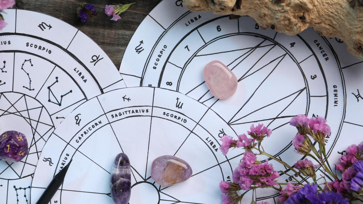 flat-lay-composition-with-zodiac-wheels-astrology-dices-wooden-table_73243800