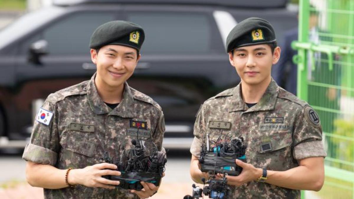 2025-06-10t001032z_1208417239_mt1afl294433510_rtrmadp_3_bts-members-rm-and-v-after-their-military-discharge-in-chuncheon_96283800