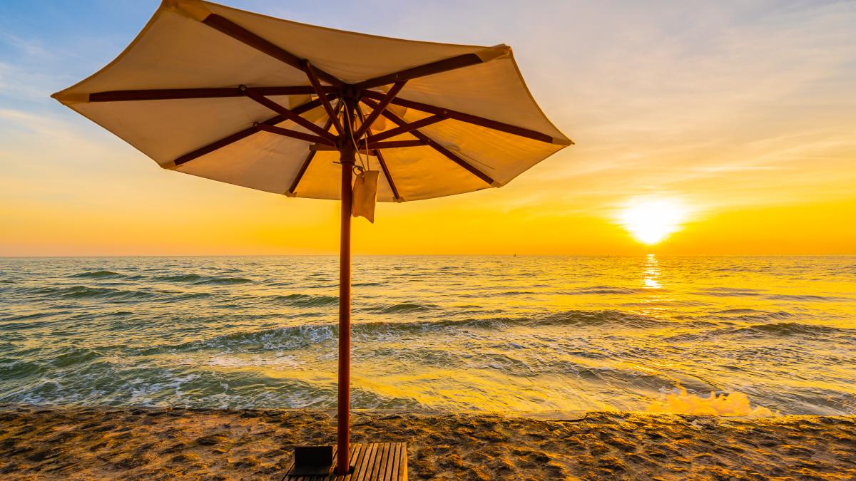 umbrella-chair-with-pillow-around-beautiful-landscape-beach-sea_58286800