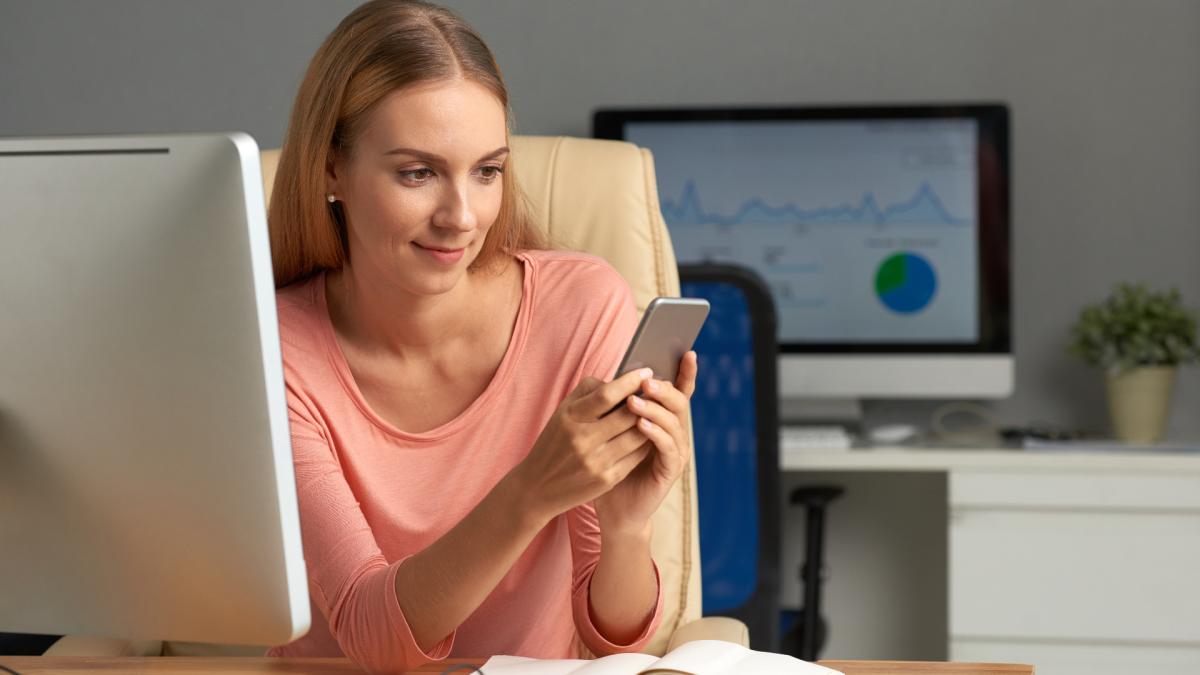 business-woman-texting-private-messages-her-workplace1