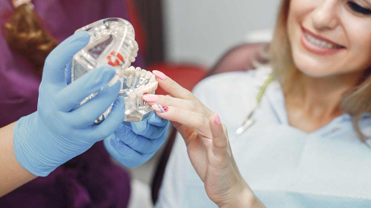 Dental Premier -- ghidul pentru dinti ficsi pe implanturi in Romania--clinica de implant dentar All-on-4 si All-on-6  -stiridiaspora.ro 2.jpg