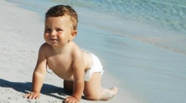 folosirea unei creme cu factor de protectie 15 pana la varsta de 18 ani poate reduce cu 78 riscul de cancer