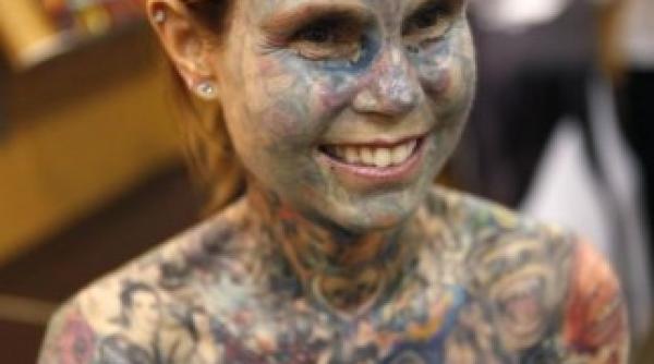 are 95 din corp acoperit cu semne si simboluri