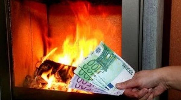 ungurii ard banii pentru a se incalzi
