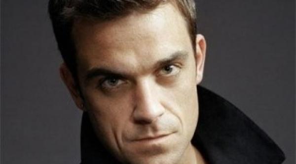 robbie williams era sa renunte la cariera afla motivul