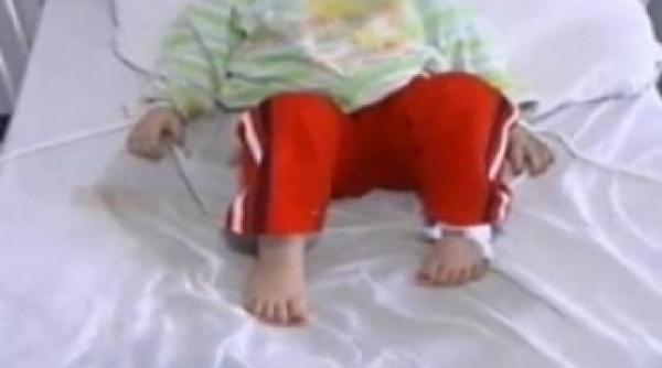 romania secolului xxi copii legati de paturi in spitalul buzau