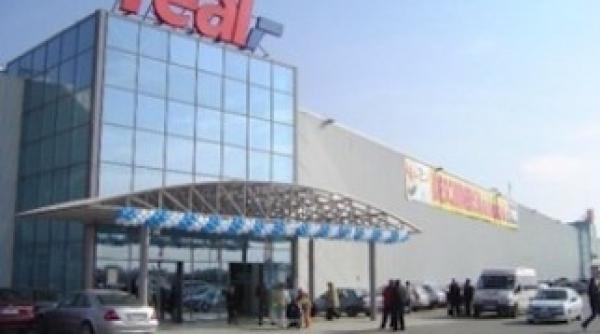 magazinele real se inchid pentru a se transforma in auchan
