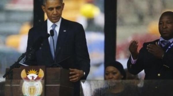 dezvaluiri socante despre cel care stat langa obama la johannesburg