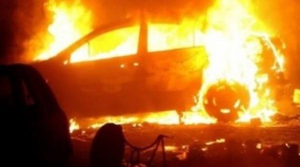 un om de afaceri si dat foc