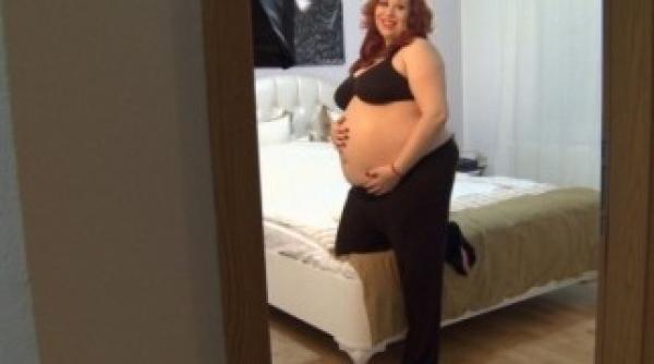 uite pe oana roman dezbracata si insarcinata 9 luni