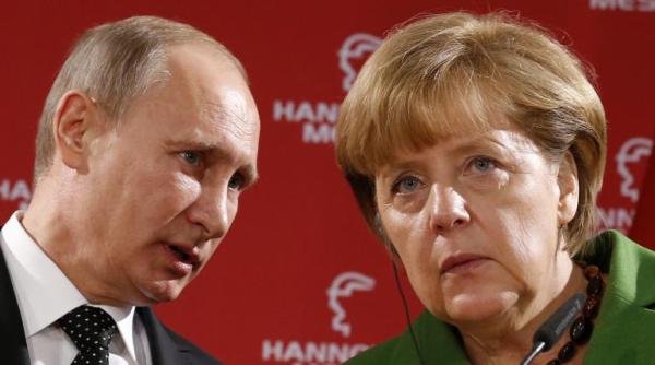 putin intr o discu ie cu merkel ucraina e in prag de razboi civil