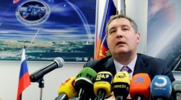 rogozin i i face poze cu bashar al assad