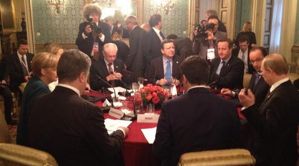 negocieri vitale la milano putin a intarziat o ora la intalnirea cu merkel