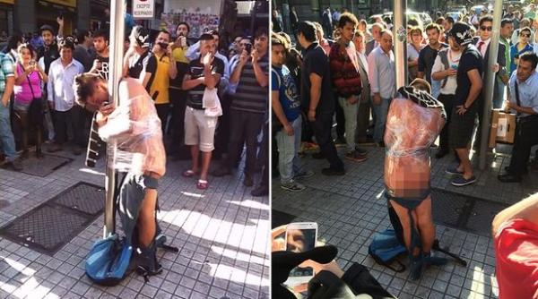 ho pedepsit in strada dezbracat i legat de stalp