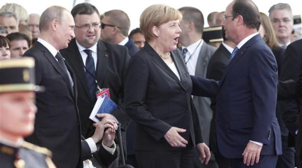 merkel prc c8prc 99i hollande la moscova pentru a i prezenta lui putin planul de pace