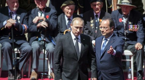 hollande i putin au anun at ca vor coopera in lupta contra isis