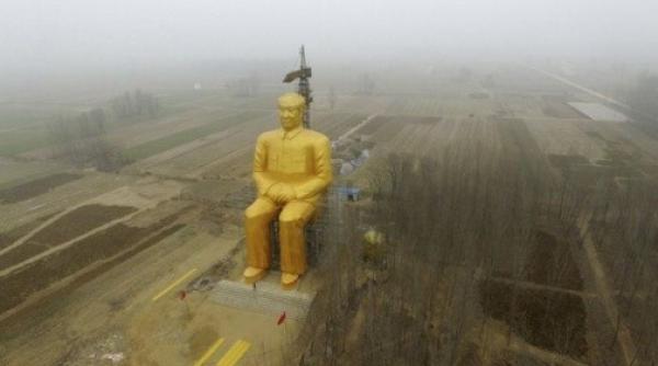 statuia imensa poleita cu aur a lui mao demolata dupa finalizare